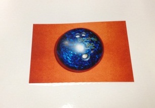 Page with photo of heavy hard ball