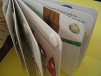 Page fluffers using Velcro dots or buttons