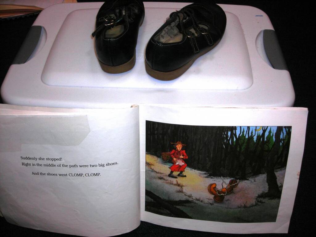 Shoes on top of a story box