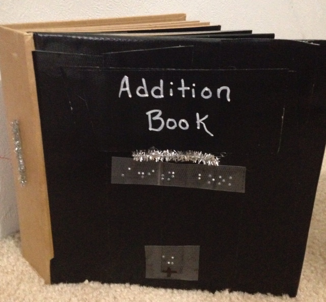 Cover of Addition Book with braille label
