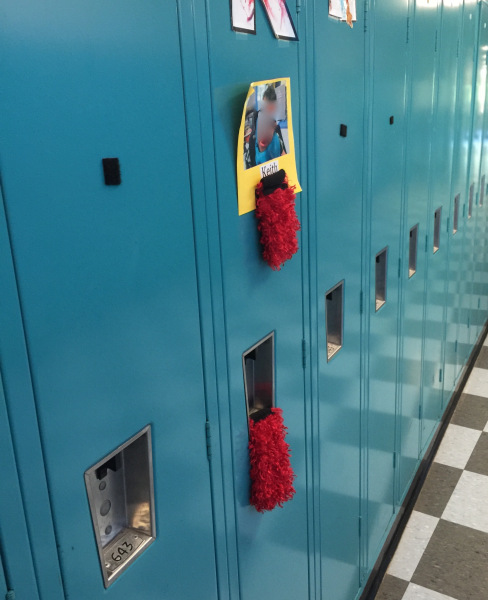 Hanging something red on a child's locker can give them a visual target to more easily locate the locker.