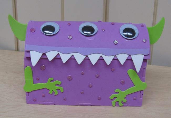 a box decorated like a monster