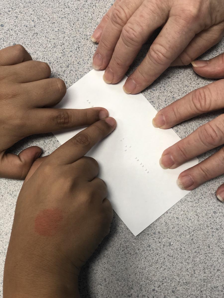 Reading braille cards with leading lines