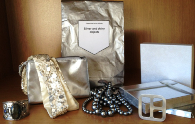 concept bag of silver and shiny beads, buckles, bracelets