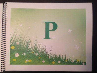 the letter P with a green background and grass on the bottom of the page