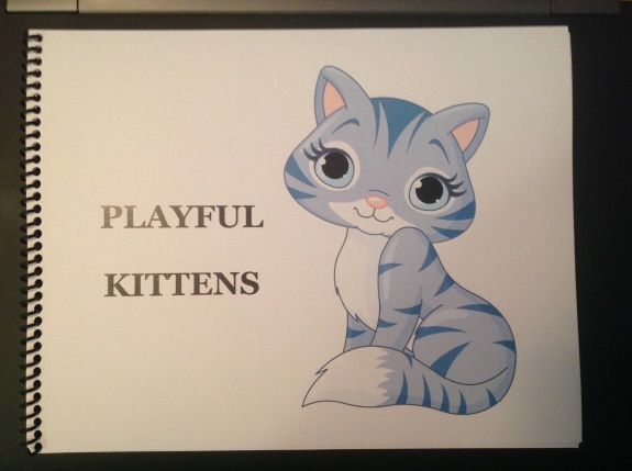 a book cover with a picture of a kitten and the title Playful Kittens