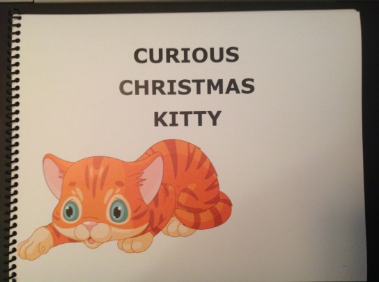 book cover with image of a cat and title Curious Christmas Kitty