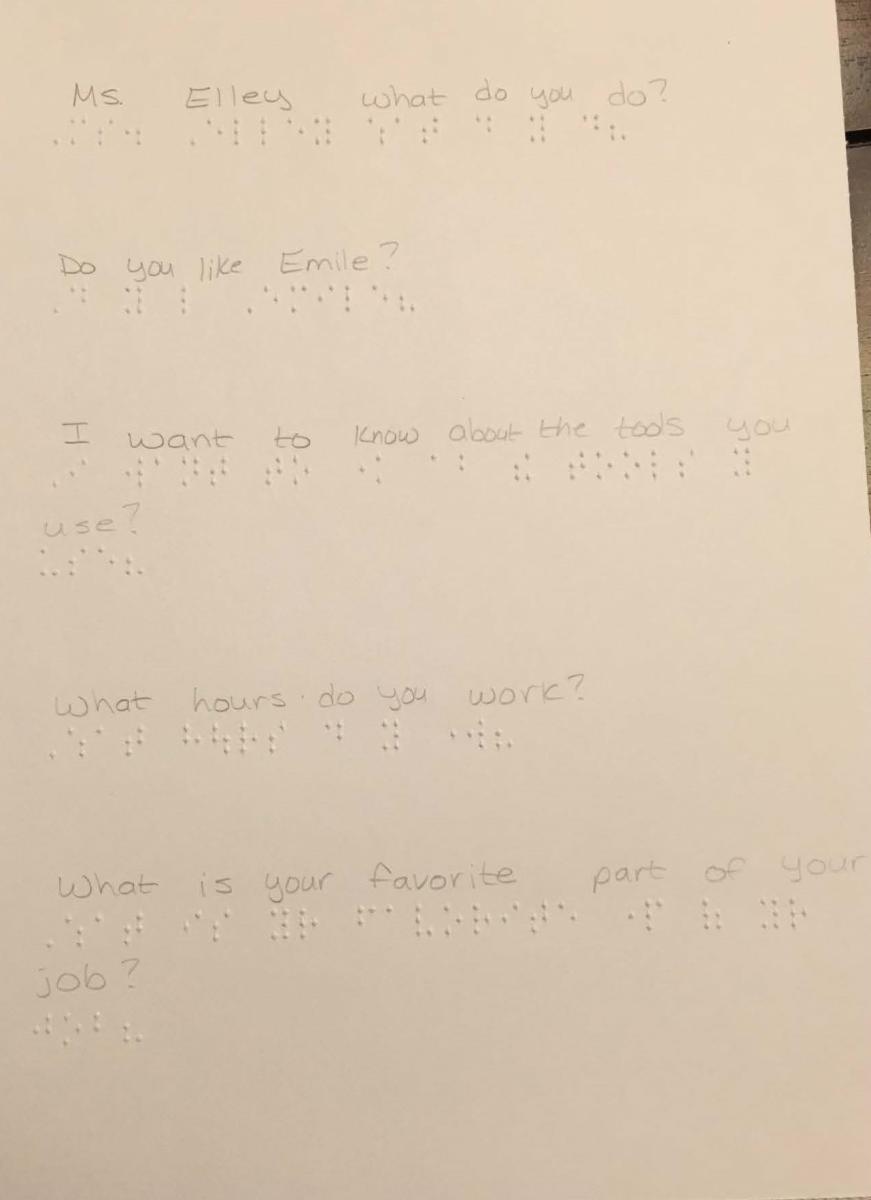 fifth page of report with braille and print text