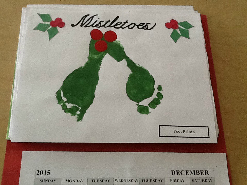 december calendar picture of mistletoe made with footprints