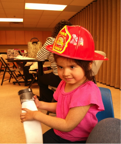 Girl wearing fire hat