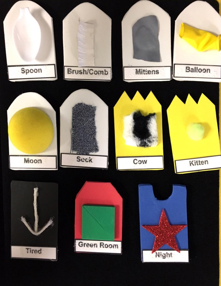 Click to enlarge the tactile symbols. tactile symbol board