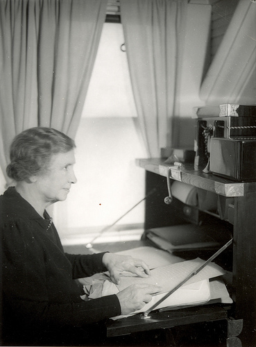 Helen Keller at her desk