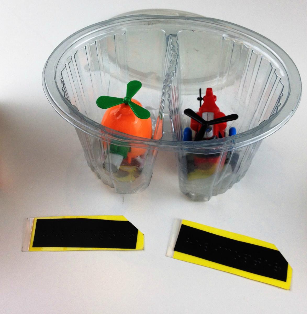 initial letter sound box with toy helicopter inside