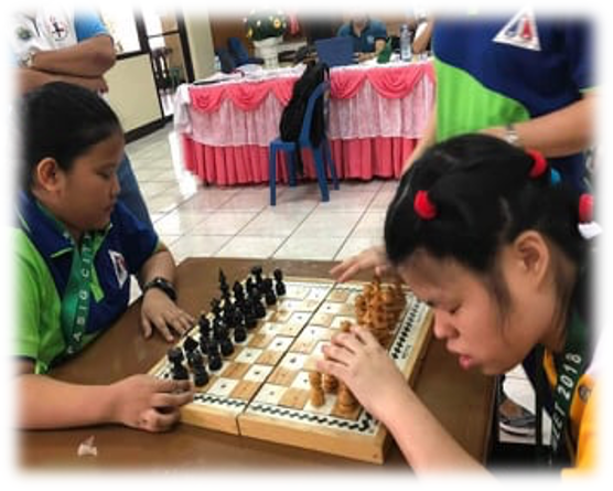 Kara playing chess