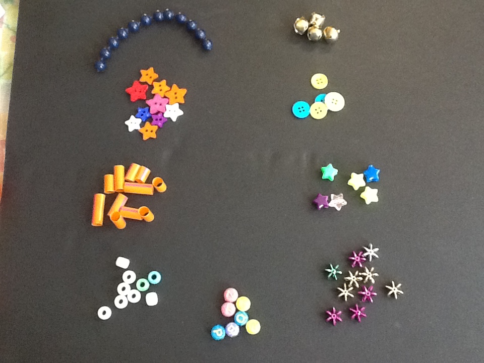 beads, candy hearts, small stars