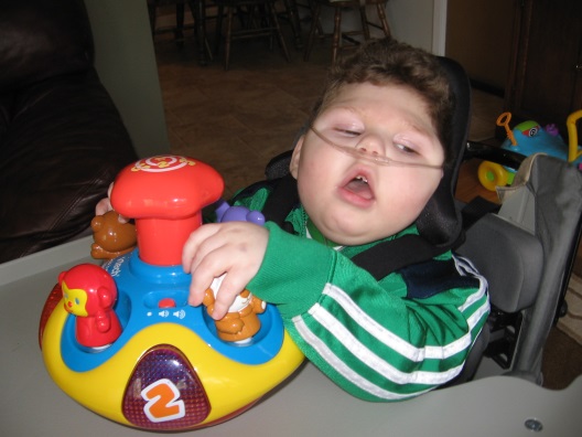 a child touching a sensory toy