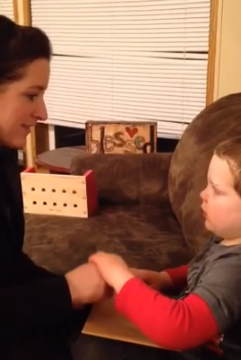 liam and mom reading a book