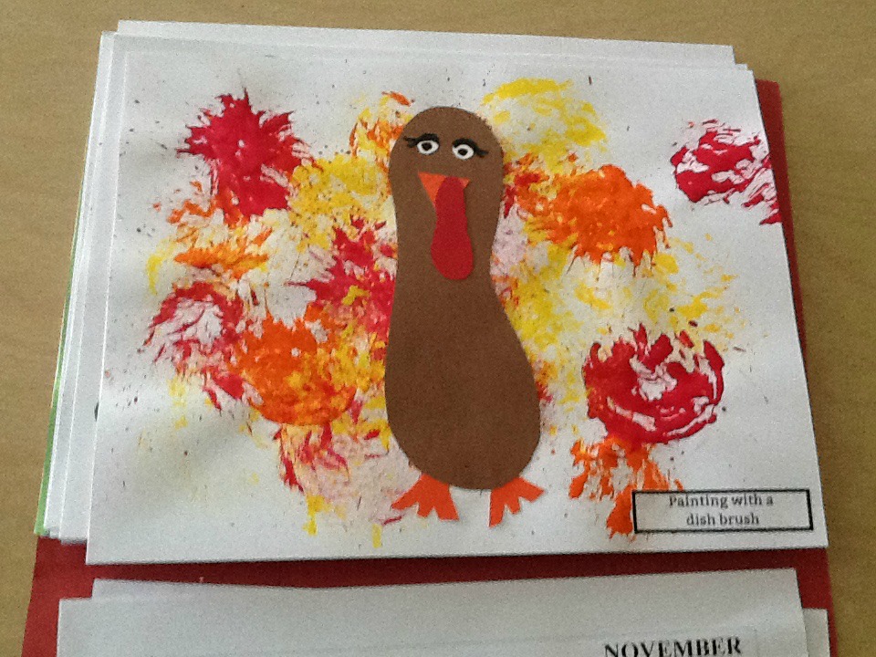 November calendar image made into a turkey with a dish brush
