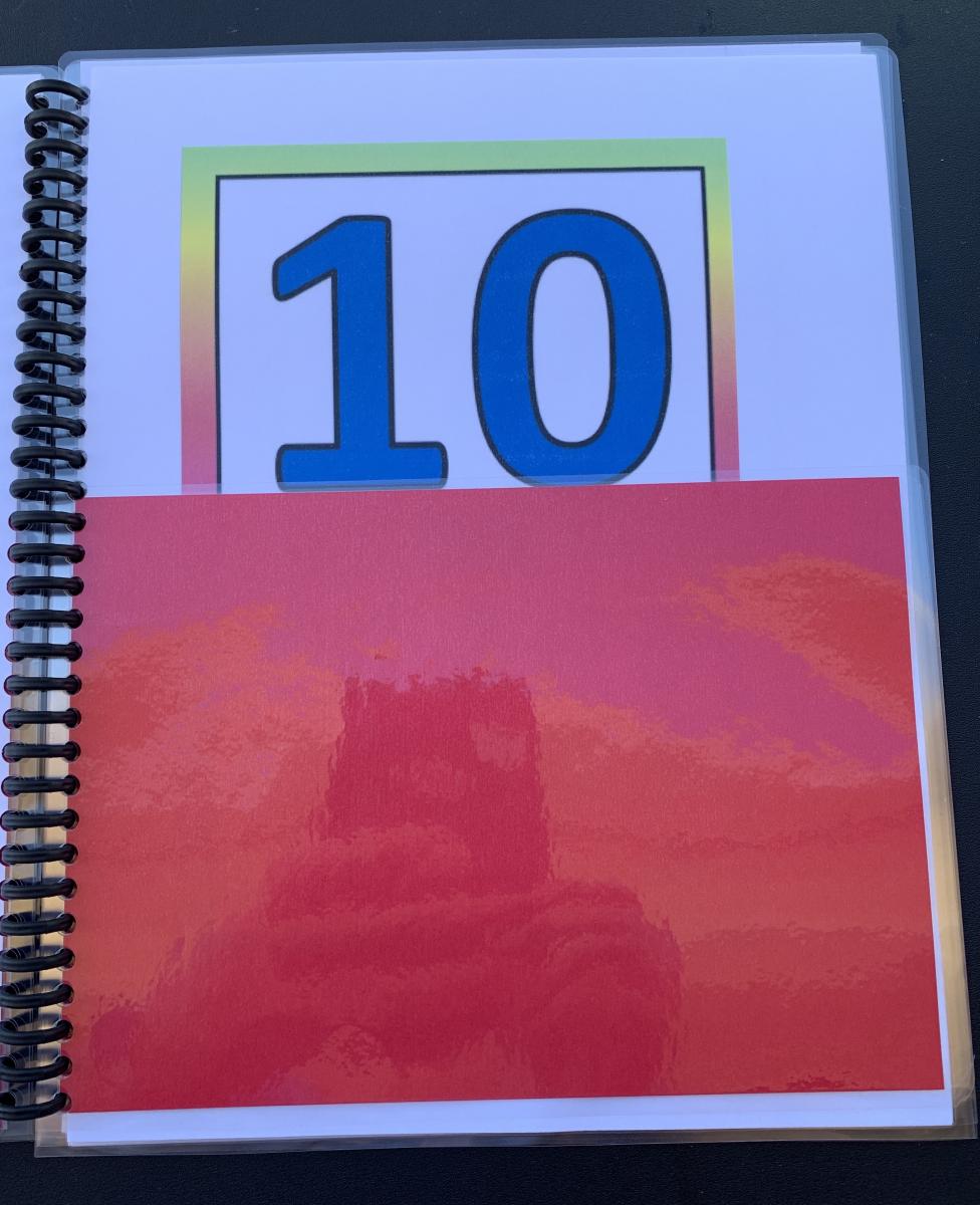 Numeral 10 at top of page with bottom half of the page covered Numeral ten with bottom half of the page covered