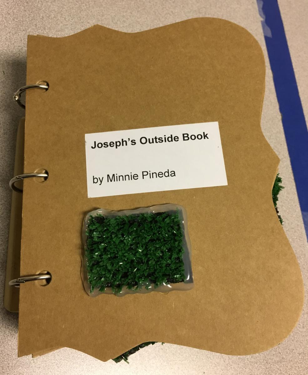 the cover of a book with the title Joseph's Outside Book and a patch of artificial grass glued to the cover