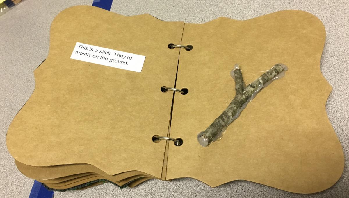 a page with a stick glued to it and text describing it