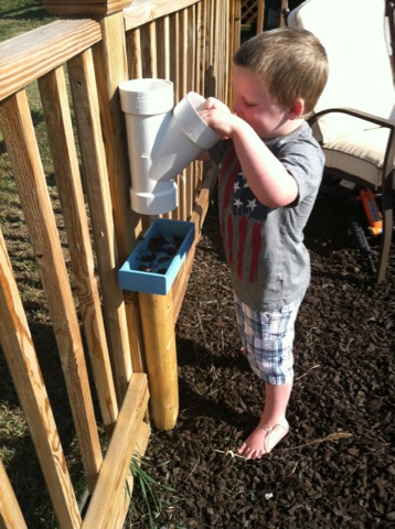 Putting balls into PVC pipe