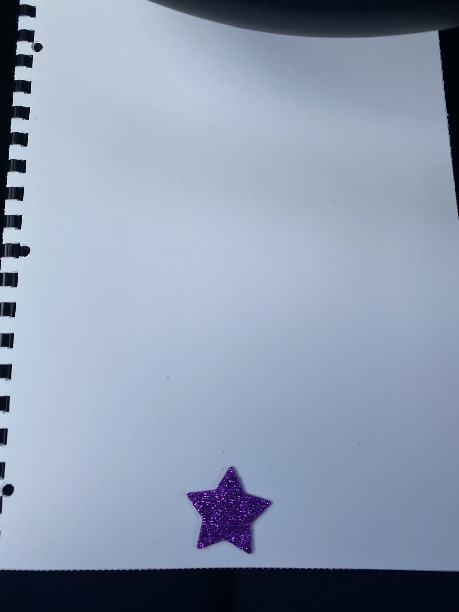 Texture book with star at bottom of page