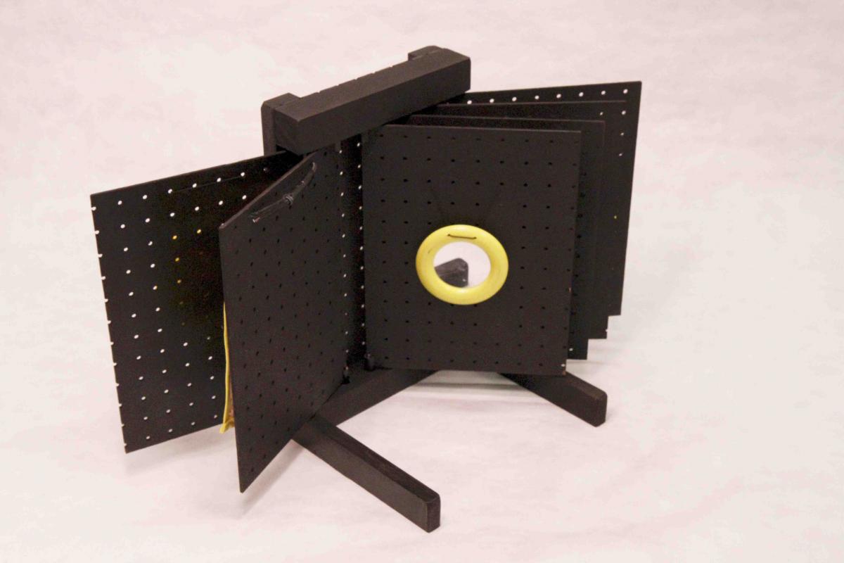 Page of Pegboard book with yellow ring
