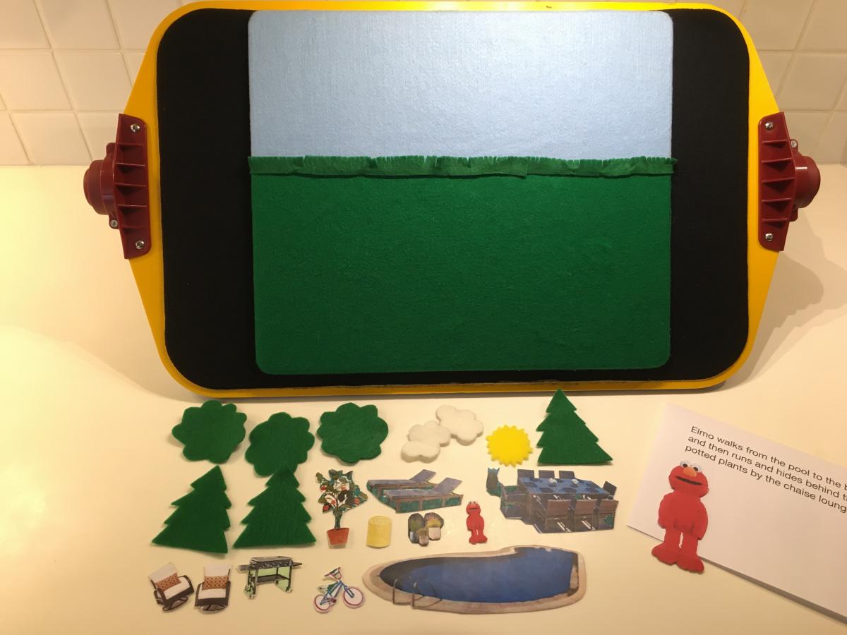 All-in-One-Board with Elmo and scenery on table