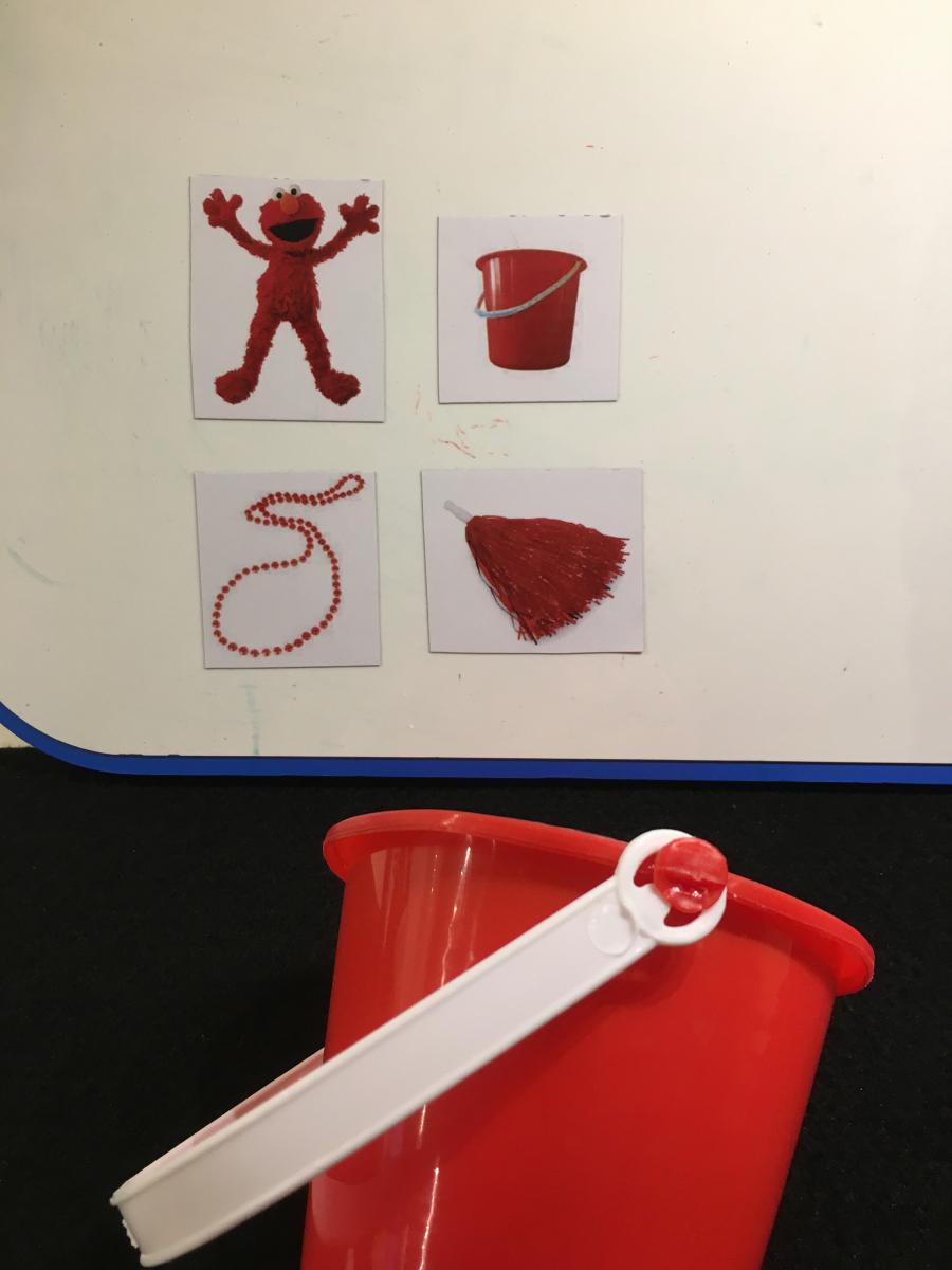 Red bucket and photo cards