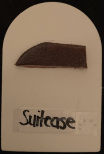 Tactile symbol for suitcase Tactile symbol for suitcase