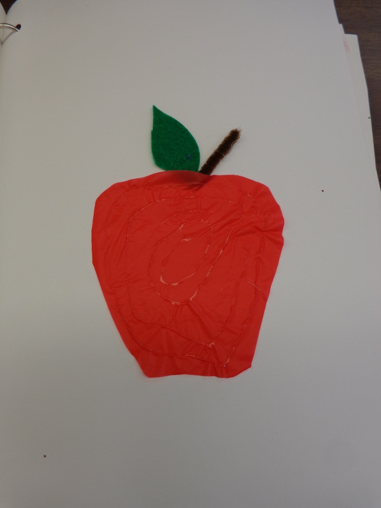 Plastic apple with raised glue lines