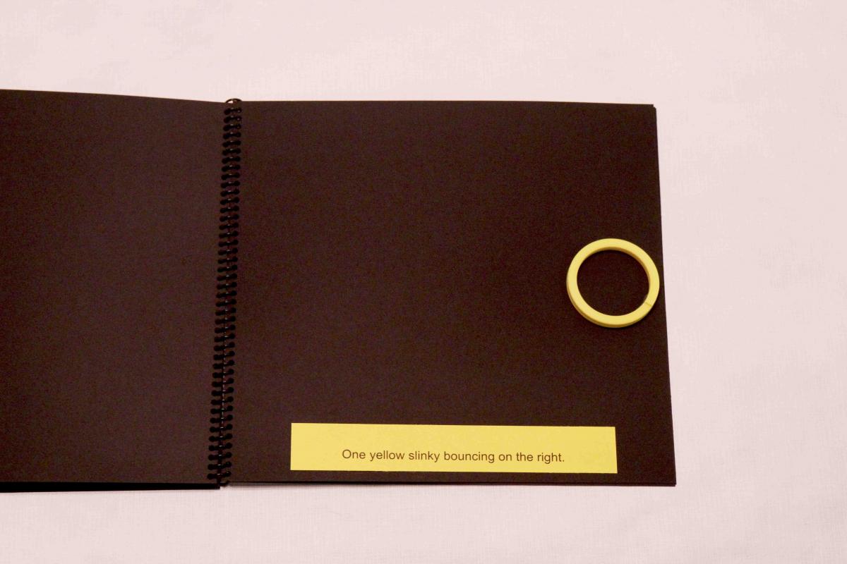 Page of yellow slinky book