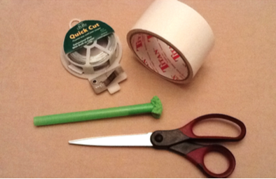 tape, wire, scissors, and a straw with a sponge squeezed into the end