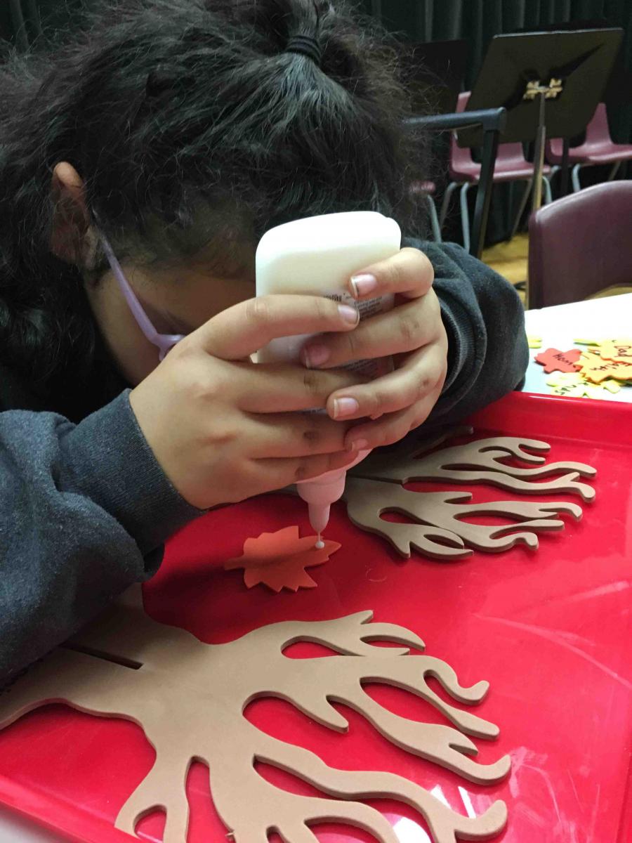 Putting glue on the leaves