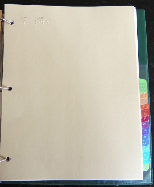 Word Bank Binder with braille type and handwritten text 