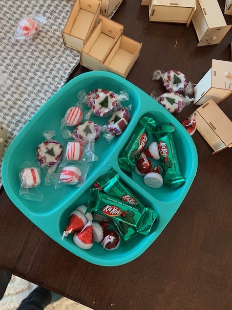 Container with compartments full of candy