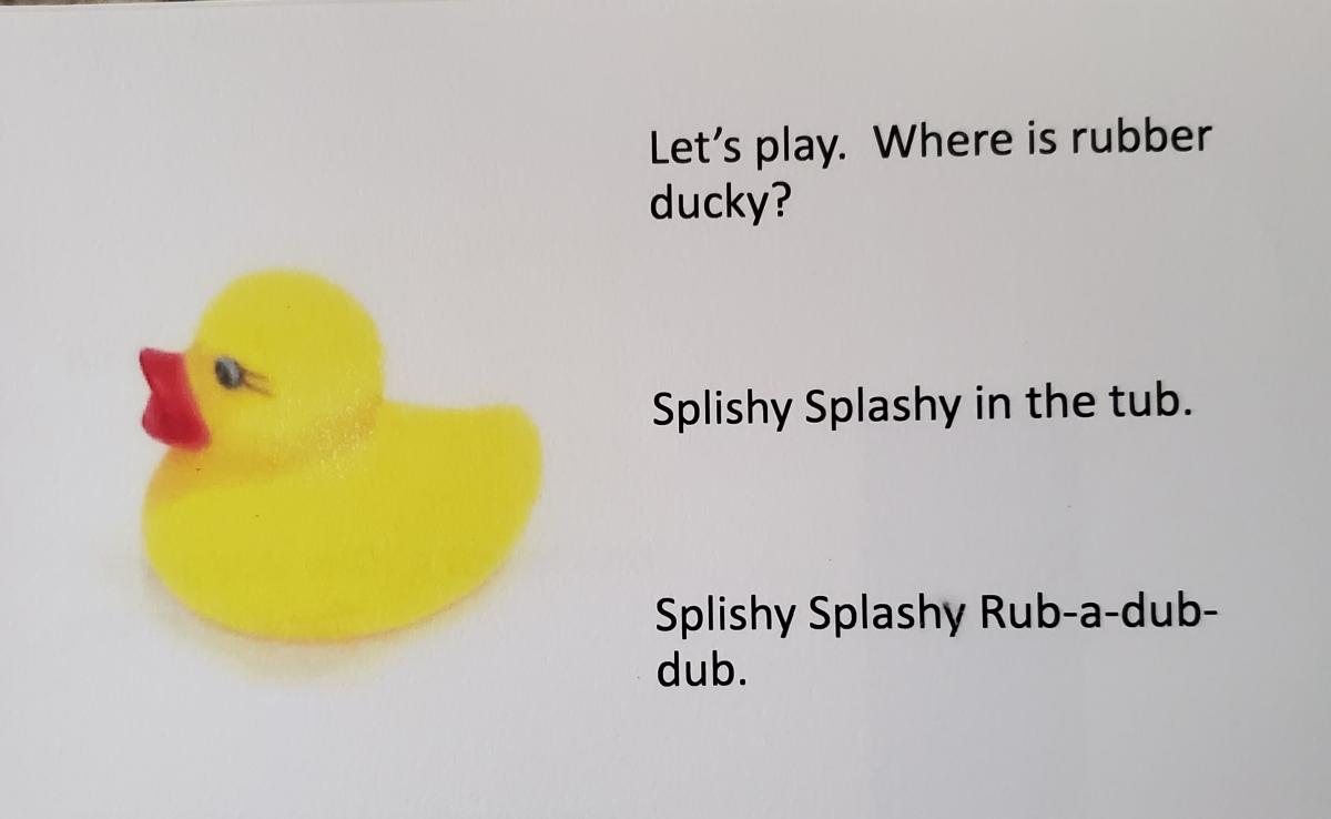 Bath book page about rubber ducky with text 