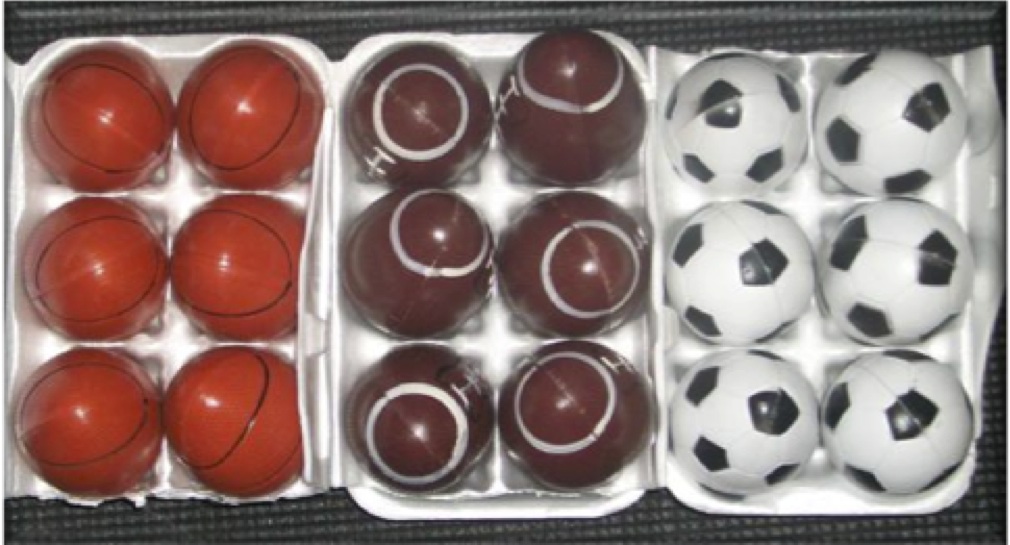 plastic footballs, basketballs, and soccer balls in egg cartons