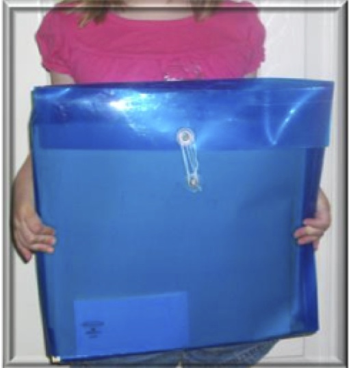 Scrapbook paper holder used as school folder for braille on 11x11 1⁄2 paper.