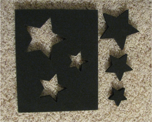 Formboard of different sized black stars