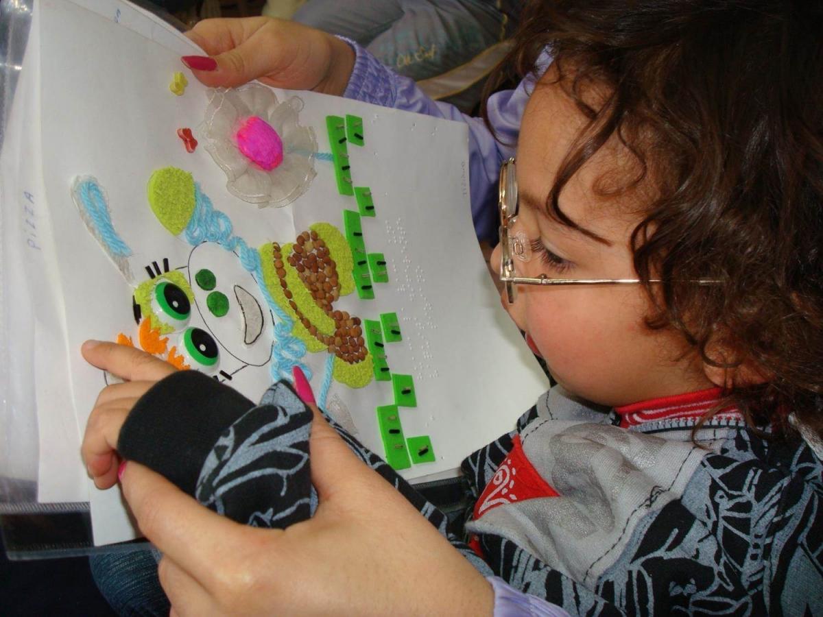 Using braille on tactile books