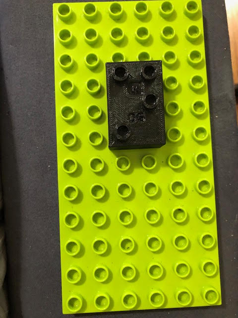 Braille letter on Duplo base plate