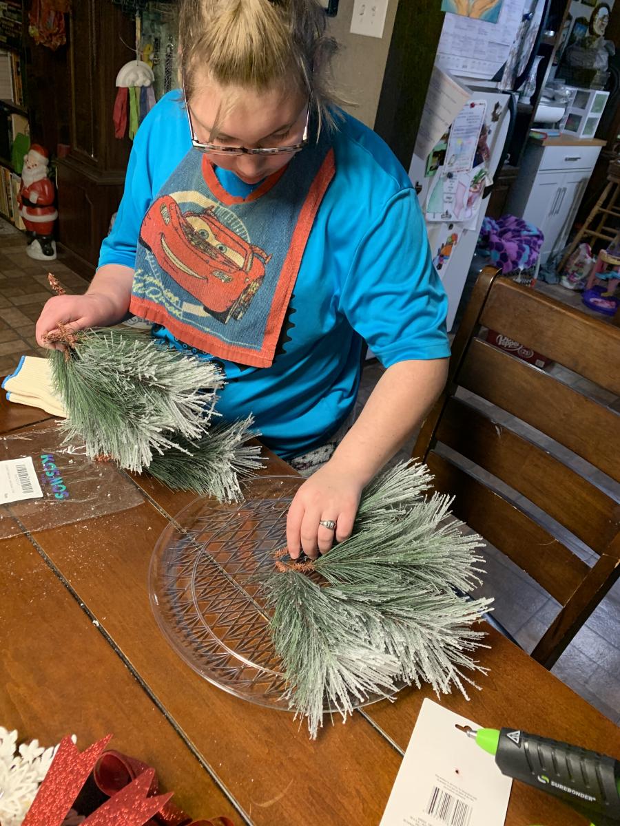 Arranging the pine boughs