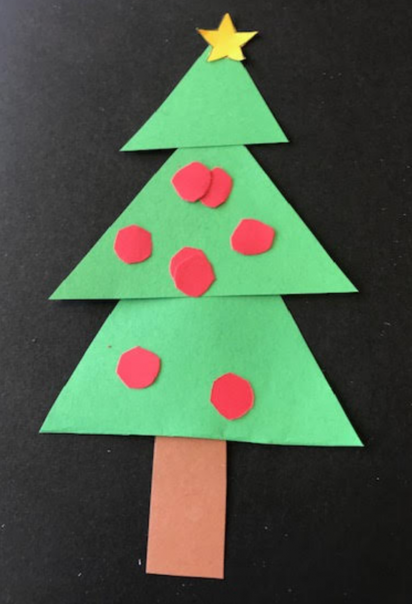 Christmas tree made out of cut out construction paper