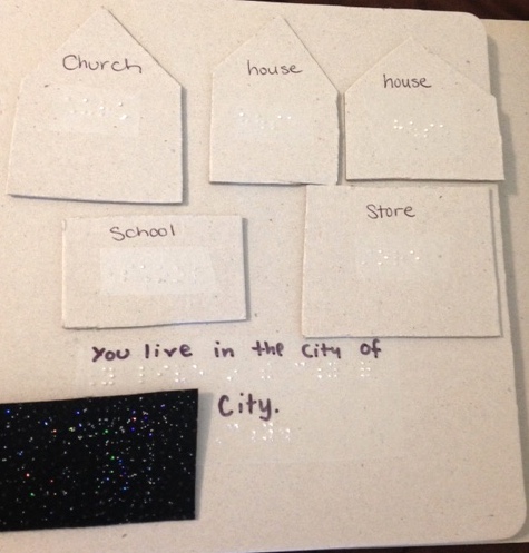 City tactile page with braille