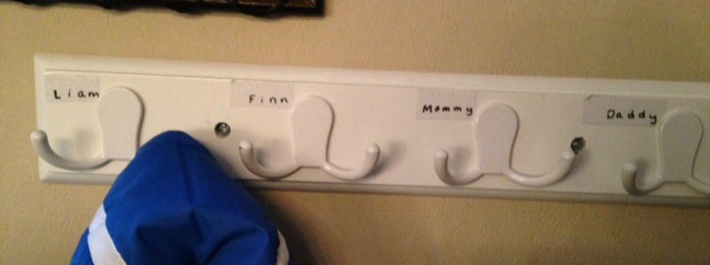 coat hangers with braille labels for names
