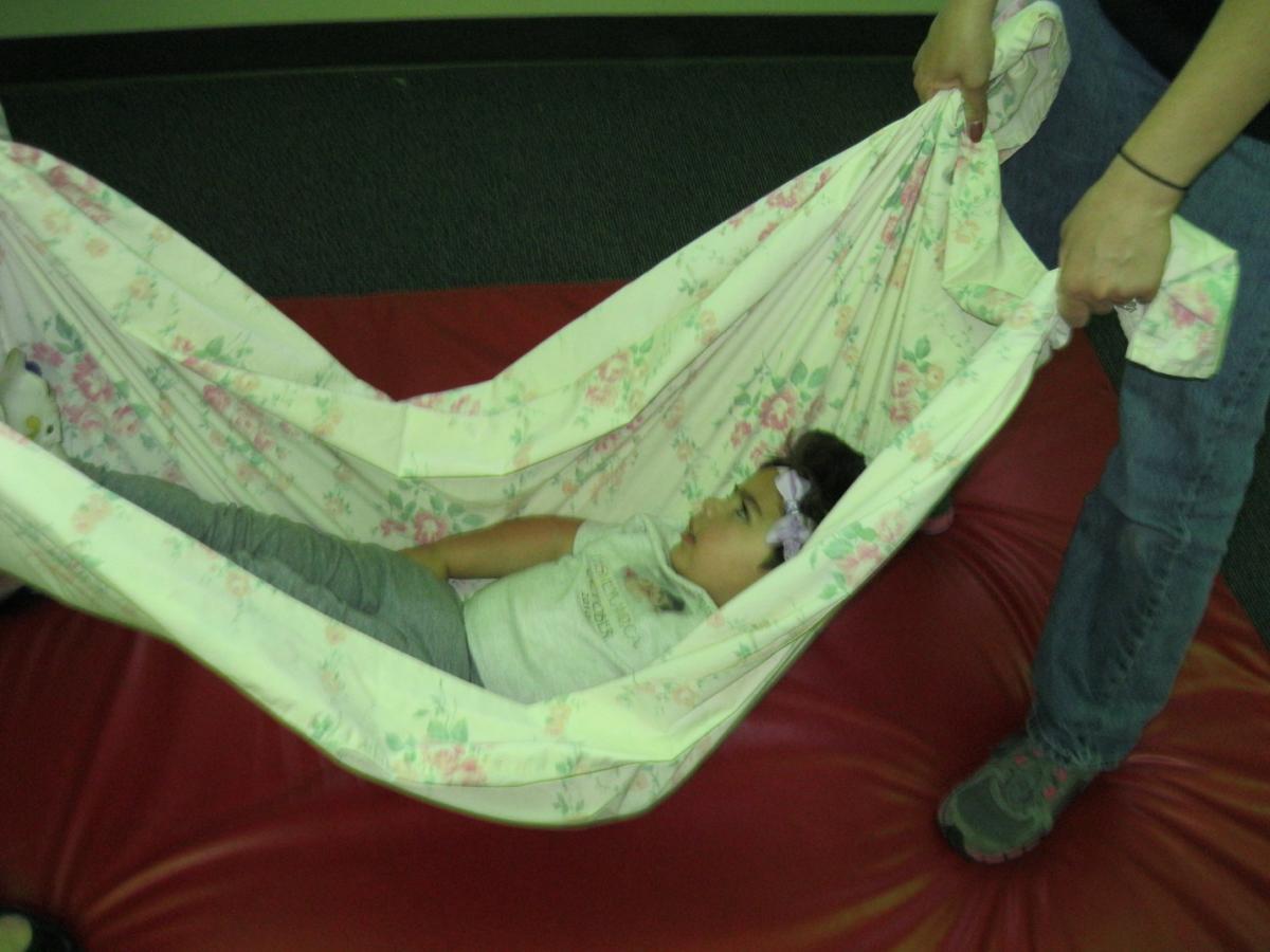 Swinging in a sheet