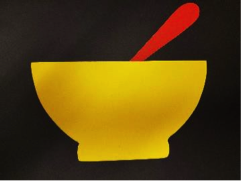 Red spoon in yellow bowl