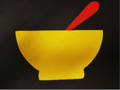 Red spoon in yellow bowl Red spoon in yellow bowl